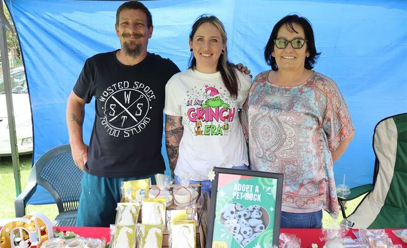 Community members browse for festive treats at the Hebra Homemade Harvest – Christmas in the Park Market held at Hurlyvale Park.