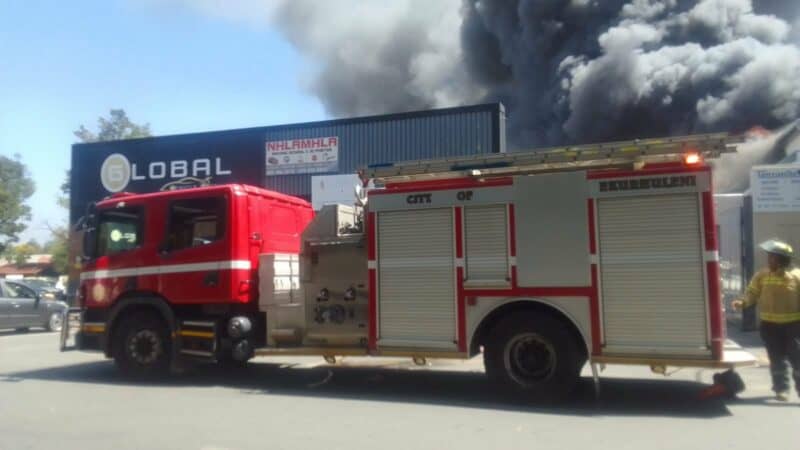 Emergency services respond to blaze on Van Riebeeck Avenue as authorities urge public to avoid the area.