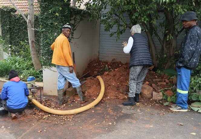 An underground fire hydrant bursts on Pamin Road in Bedfordview, leaving residents without water while gallons of water stream down the road.