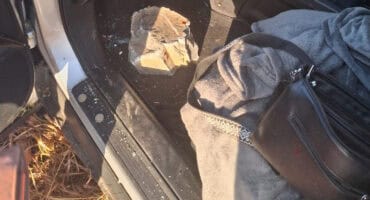 The large rock allegedly thrown from a bridge that smashed through the vehicle’s windscreen, causing the driver to lose control. Photo: EMPD
