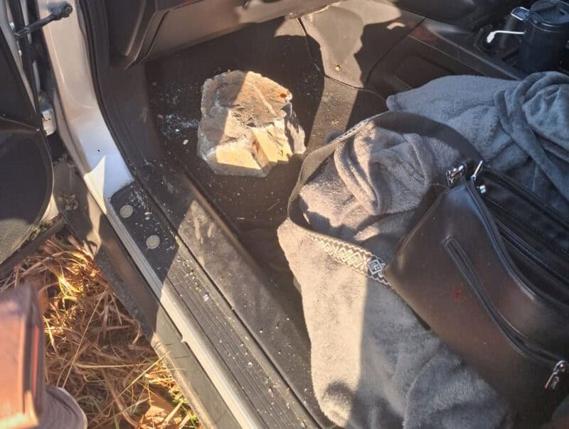 The large rock allegedly thrown from a bridge that smashed through the vehicle’s windscreen, causing the driver to lose control. Photo: EMPD