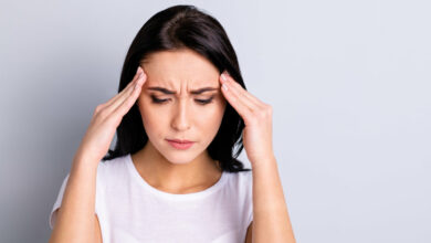 Close-up portrait of her she nice attractive lovely shine pessimistic charming sad girl suffering from high fever illness isolated over light gray pastel background