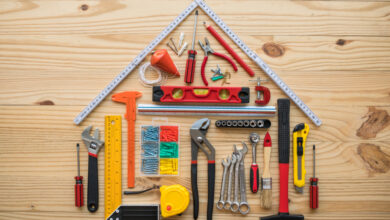 Flat,Lay,Of,Construction,Tools,As,House,Model,On,Wooden