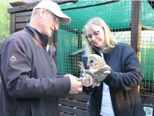 Arjen van Zwieten and Karen Mey ring the bird.