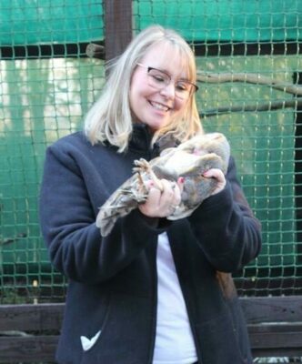 Karen Mey embraces the new arrivals as they embark on their new journey at the shelter.
