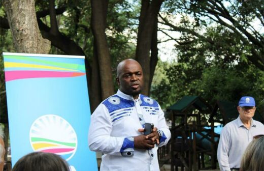 Solly Msimanga addresses residents about their plans to resolve the squatter camps in Lonehill.