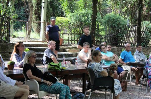 Residents attend a meeting about their battle with land invasion.