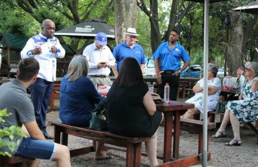 Solly Msimanga addresses residents about their plans to resolve the squatter camps in Lonehill.
