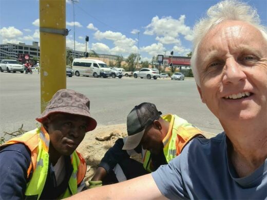 Ward 94 councillor David Foley on-site with officials repairing traffic lights on Lonehill Boulevard.