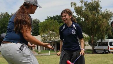 Coach Julie Bruyns and learner Grace Inglis.