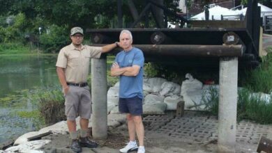 Environment manager at Lonehill Residents Association (LRA), Nadeem Abrahams and Ward 94 councillor David Foley at the Lonehill bridge that collapsed during heavy rainfall last year.