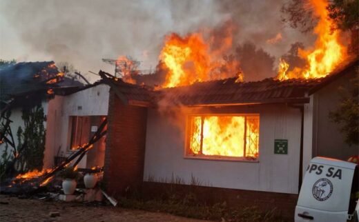 The school building on fire.