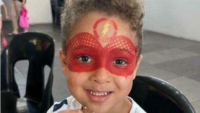 Naim Dantata loves his superhero The Flash face painting.