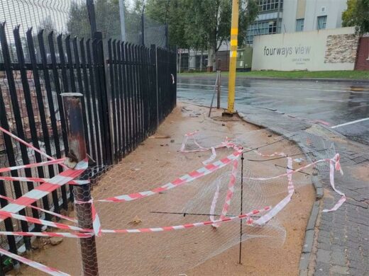 The temporary erected fence before it is damaged.