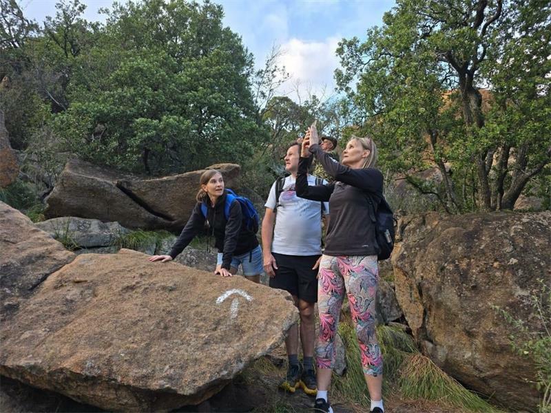 Paula Quinsee, Dawn Coulson, and Kim Greenway visit the Lonehill Koppie before it was closed.