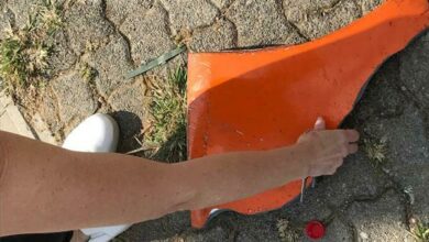 A piece believed to be from a JMPD vehicle not far from the accident scene.