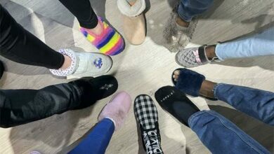 Residents show off their slippers.