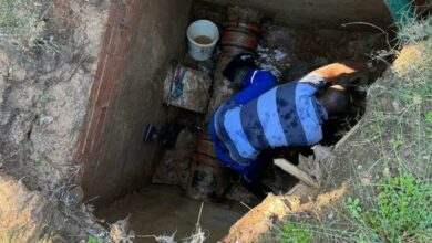 A Joburg Water worker does repairs on Holkam Road.