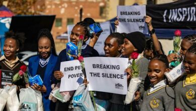 Learners standing against period poverty.