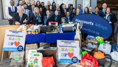 Bags of Love receives donations from the real estate office for a good cause.