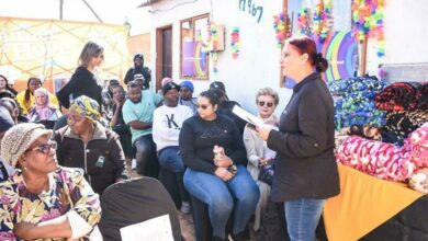 Poonam Dwarkaram speaks to the volunteers and stakeholders.