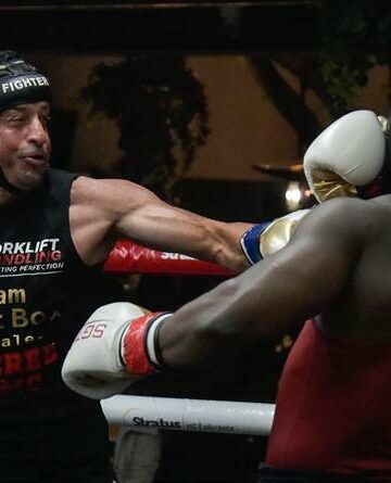 Johnny Anthony and Jeff Akwo exchange blows.