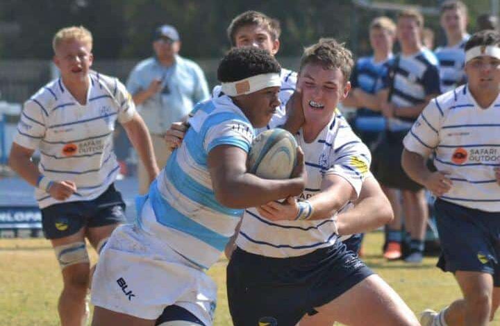 Clinton Agu carries the ball into contact. Photo Logan Frey.(1)