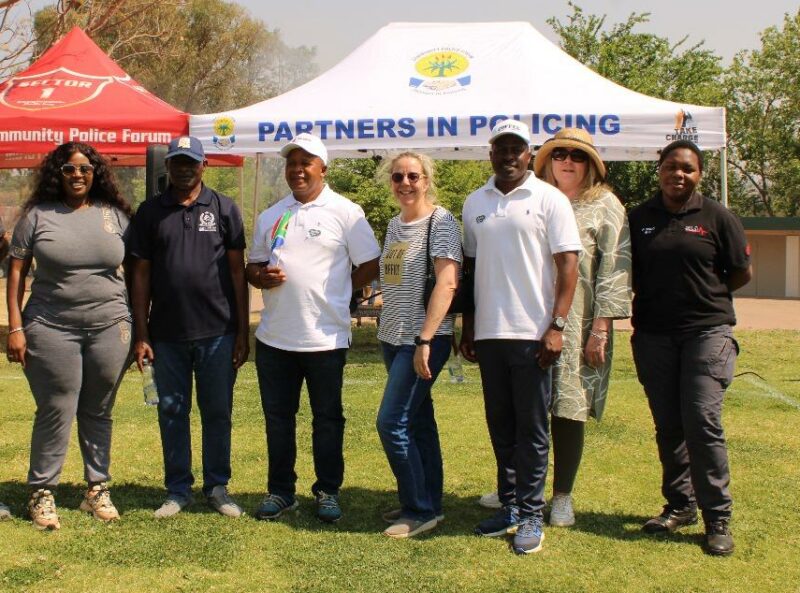 Learners, police, and community partners bond over games and laughter, celebrating unity beyond the classroom.