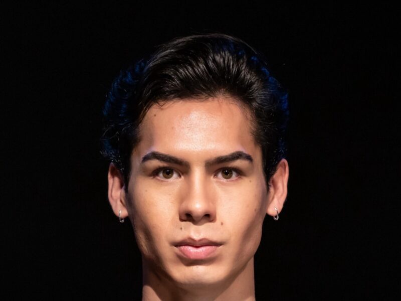 Jason Wheeler’s latest play, The Queer in the Queue, uses the simple act of waiting in line as a metaphor for queer life, exploring themes of love, memory, and family.