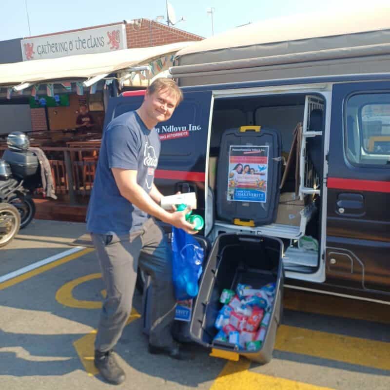 A law firm, an estate agency, and a local motorcycle group came together to collect toiletries for girls in Soweto.