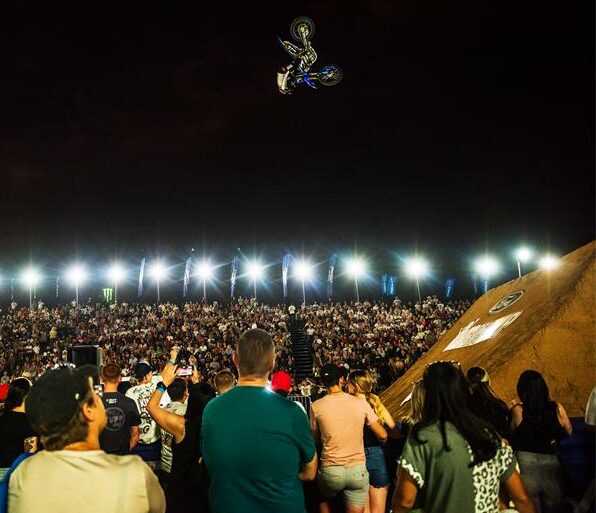 Rider hangs a tight trick at a motorcross competition. Photo: Supplied