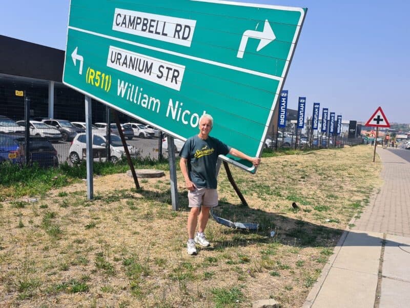 Knocked over by a car and slowed by tight budgets, the damaged road sign is a reminder from councillor David Foley for the community to report even small problems.