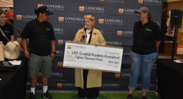 Lonehill Resident Association team receive the R15 000 donation raised from the Lonehill Triple Mile fundraiser at Lonehill Shopping Centre in October 18, 2025. Photo: Supplied