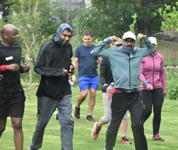 Resident brave the rain to raise funds for community projects during the Lonehill Triple Mile Fundraiser on October 18, 2025, at Lonehill Shopping Centre. Photo: Supplied