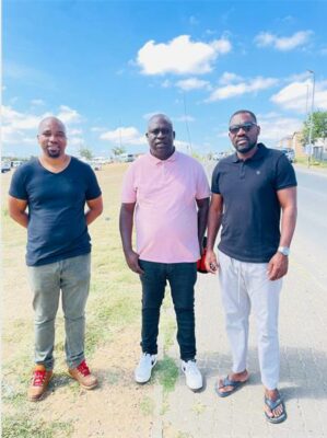 Loyiswa Toyiya, community activist, ward councillor Rufas Maswazi, and Godfrey Sinthunule, community liaison officer, lead a march to the department of education on February 10, 2026. Photo: Ayanda Ntshingila