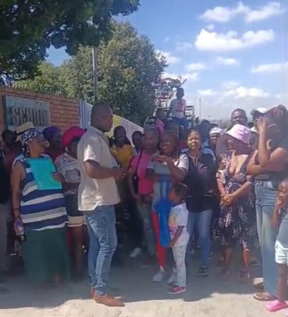 Parents, accompanied by a community activist visited the school on February 9 after their children were left without placements, warning that they will bring learners to class in uniform if the Department of Education does not act urgently.
