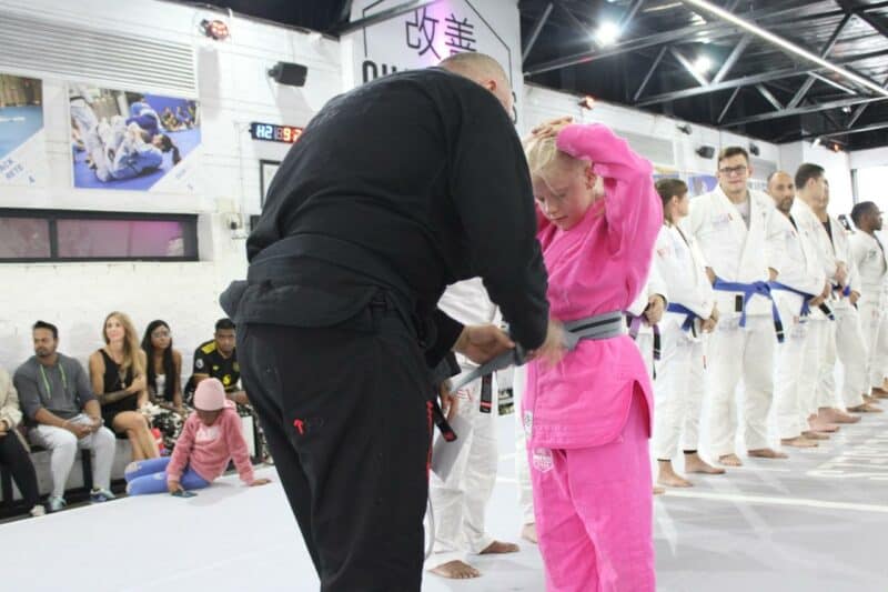 Brazilian jiu-jitsu students demonstrated skill, resilience, and determination as they earned new belts at a demanding grading session.