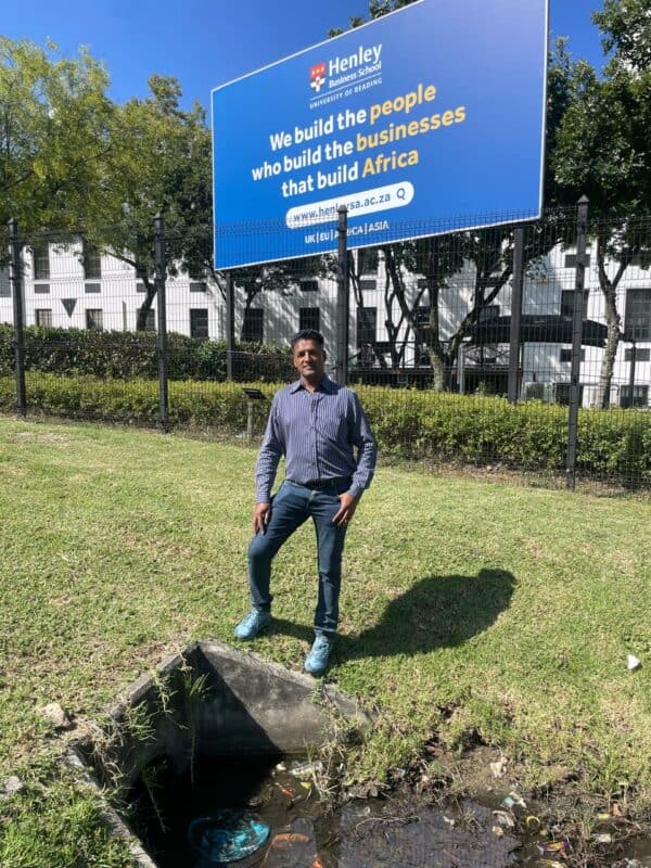 Residents and students near Henley Business School are calling for urgent intervention as a persistent groundwater flow, believed to stem from a natural spring, continues to erode the road.