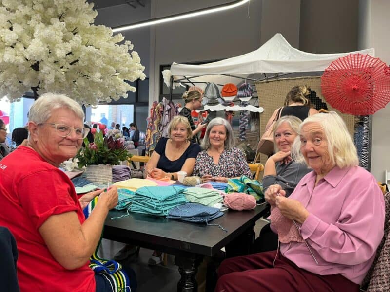 The KnitWits were hard at work knitting even more blankets and other handcrafted items that would be donated to those in need.