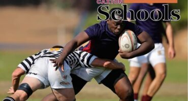 St John’s College rugby player secures ball