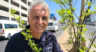 : Ward councillor David Foley stands next to a newly planted tree on July 31, 2025. Photo: Ditiro Masuku