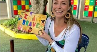 Kerry Chapman holding her book, I Am Brave, during one of her readings and workshops around Fourways Pre-schools. Photo: Supplied