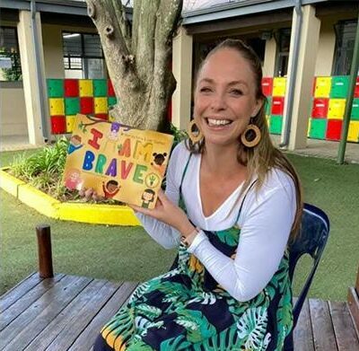 Kerry Chapman holding her book, I Am Brave, during one of her readings and workshops around Fourways Pre-schools. Photo: Supplied