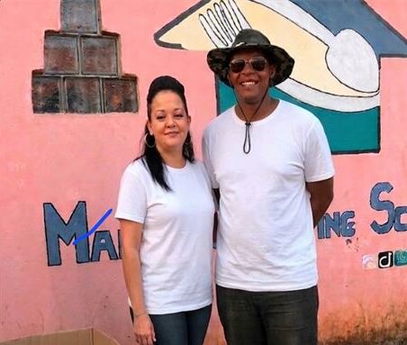 Yolandi Green and David Barrows at the Mahalia feeding scheme. Photo: Supplied
