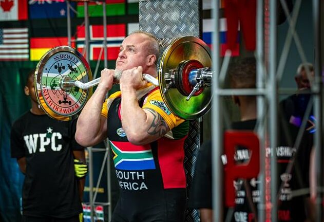 Gary Katzen wins 1st place and the gold medal in the masters 100 kg division in both strict arm and freestanding Curl. Photo: Supplied