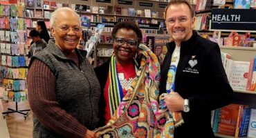Zona Mzimba, Velly Matsebatlela, and Lynton Lefevre are at the Exclusive Books for the 67 Blankets for Mandela Day initiative. Photo: Supplied