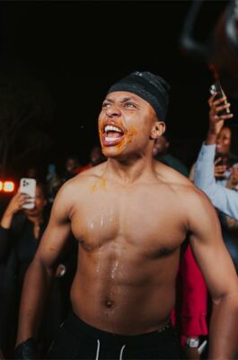 Tshepe Parkies smiles through the heat during the spicy food challenge on May 13, 2026. Photo: Supplied