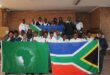 Itirele-Zenzele Comprehensive High School learners hold African flags with pride on June 11, 2026. Photo: Reitumetse Gugushe