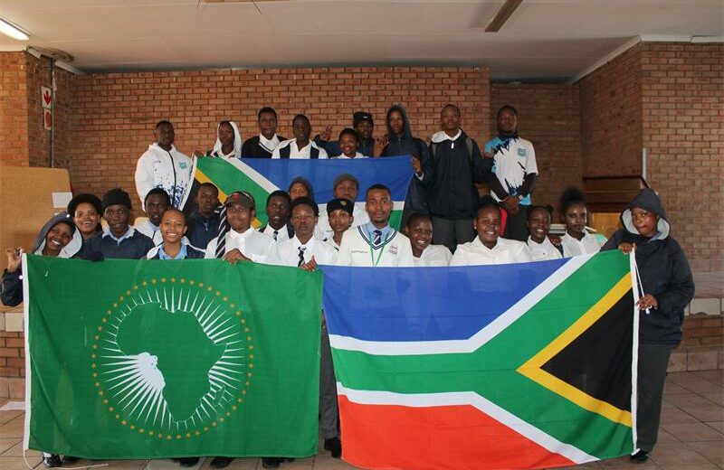 Itirele-Zenzele Comprehensive High School learners hold African flags with pride on June 11, 2026. Photo: Reitumetse Gugushe