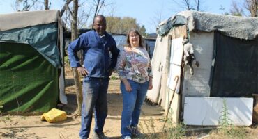 Silent Hlongwane and June Julyan at the informal settlement at the confluence of the Braamfontein and Sandspruit rivers on June 2, 2026. Photo: Ayanda Ntshingila